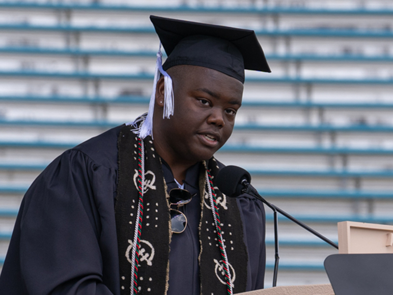 Jalon Young reading poetry at Commencement 2022