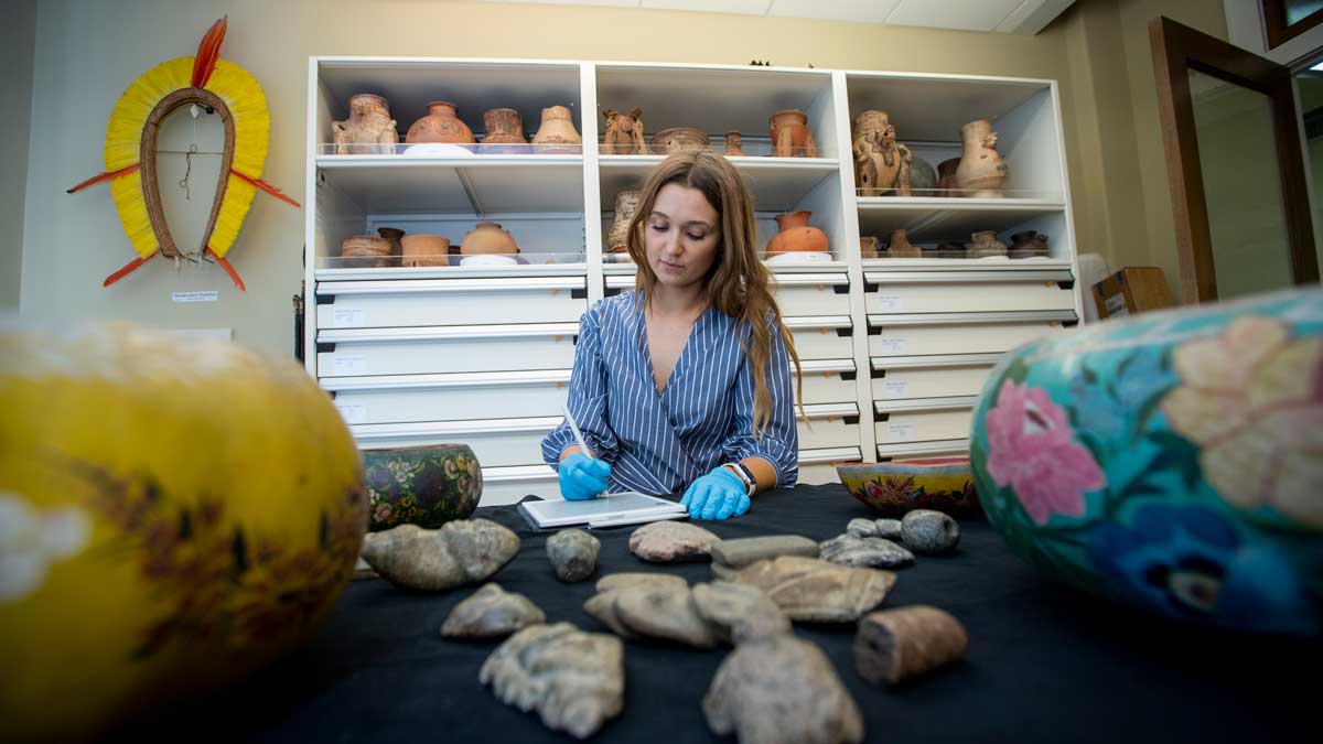 Anthropology graduate student performing research at Tulane University