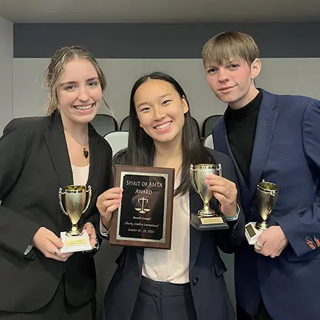 Gracie Gargulio, Yilan Tang, and Robbie Johnson at a Competition at the University of Mississippi