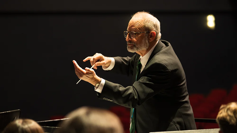 Longtime Director of Bands Barry Spanier, Conducting the Tulane Orchestra