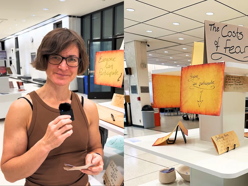 Tulane Professor Georgi Gardiner Gardiner beside an interactive library display