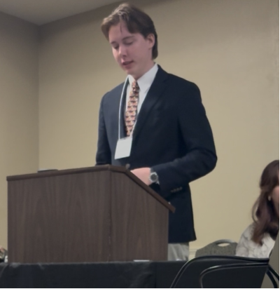 Adrian Serieyssol, a Junior Tulane history major, during his presentation titled “Allan Jaffe, The J