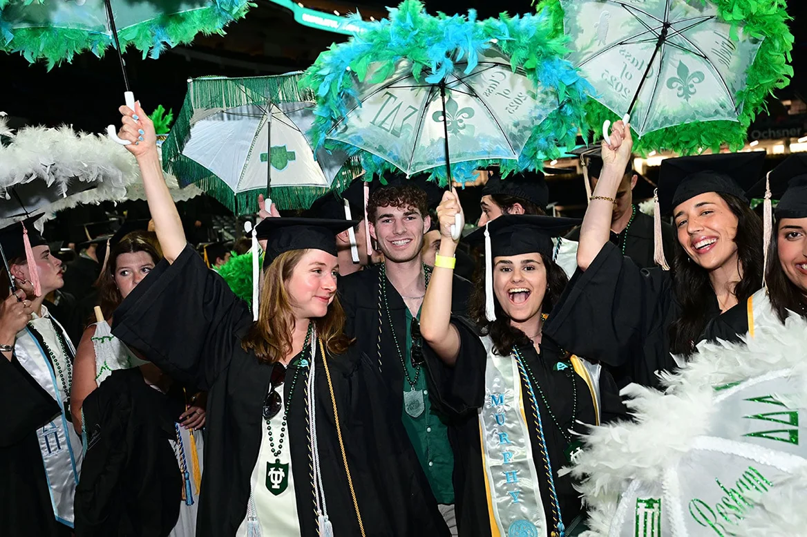 Tulane students cheer, joyfully at their commencement