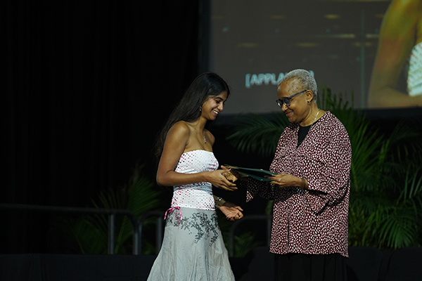 Tulane Department of History Professor Laura Rosanne Adderley gives award to student