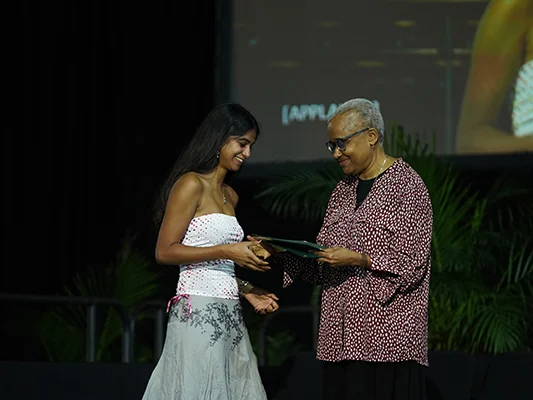 Tulane Department of History Professor Laura Rosanne Adderley gives award to student