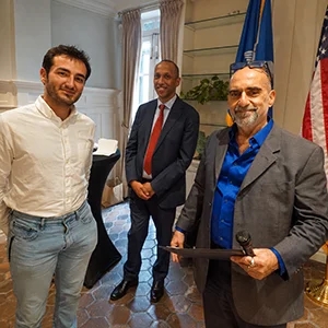 Doruk Toydemir, Hon. Rodolphe Sambou, and Michael Syrimis