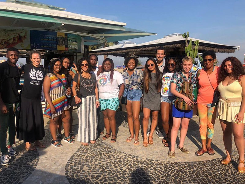 Tulane students pose with Annie Gibson and Carolyn Barber Pierre