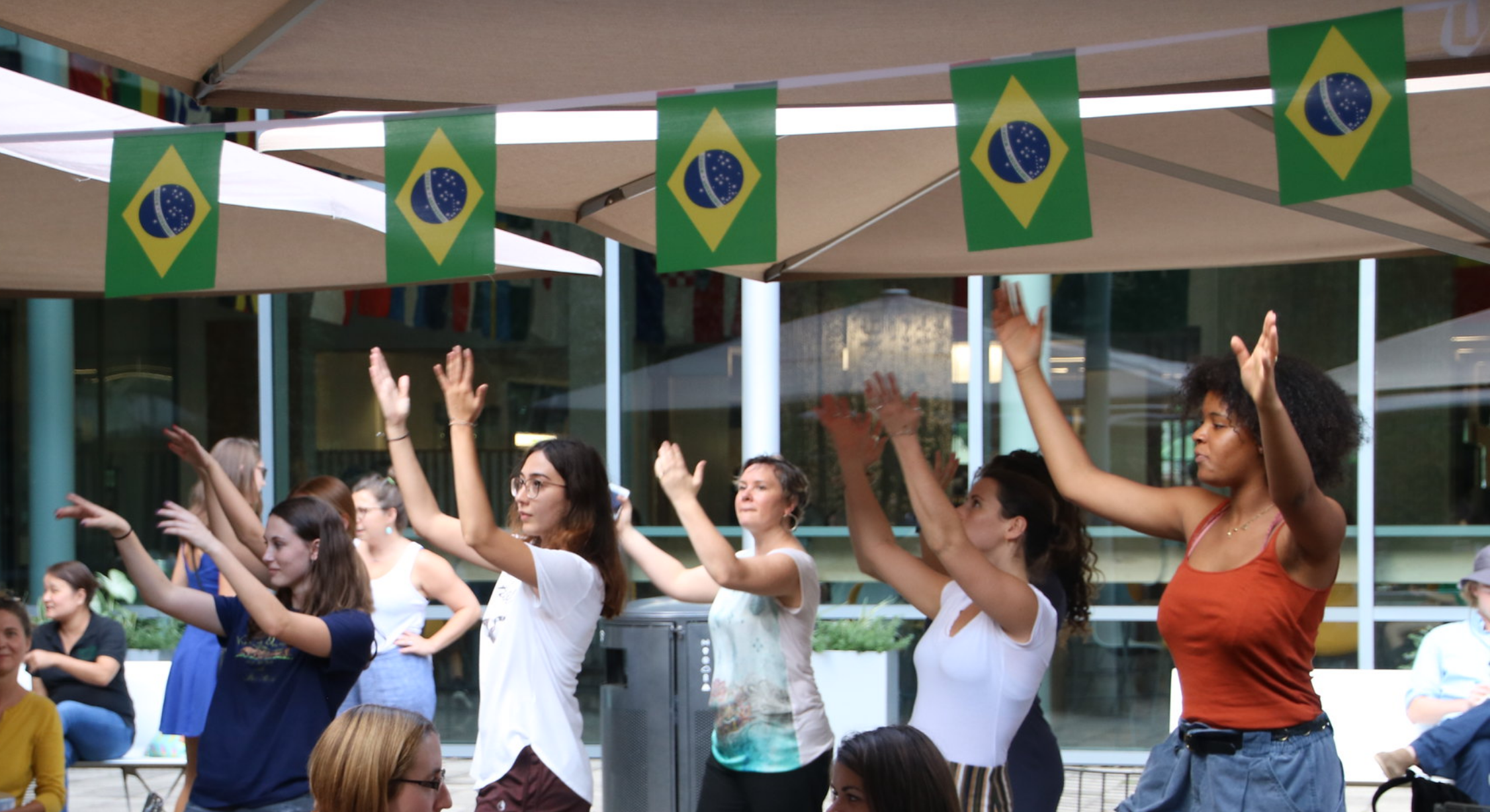 Megwen Loveless (middle) and students at the “PORtrait of Brazil” event