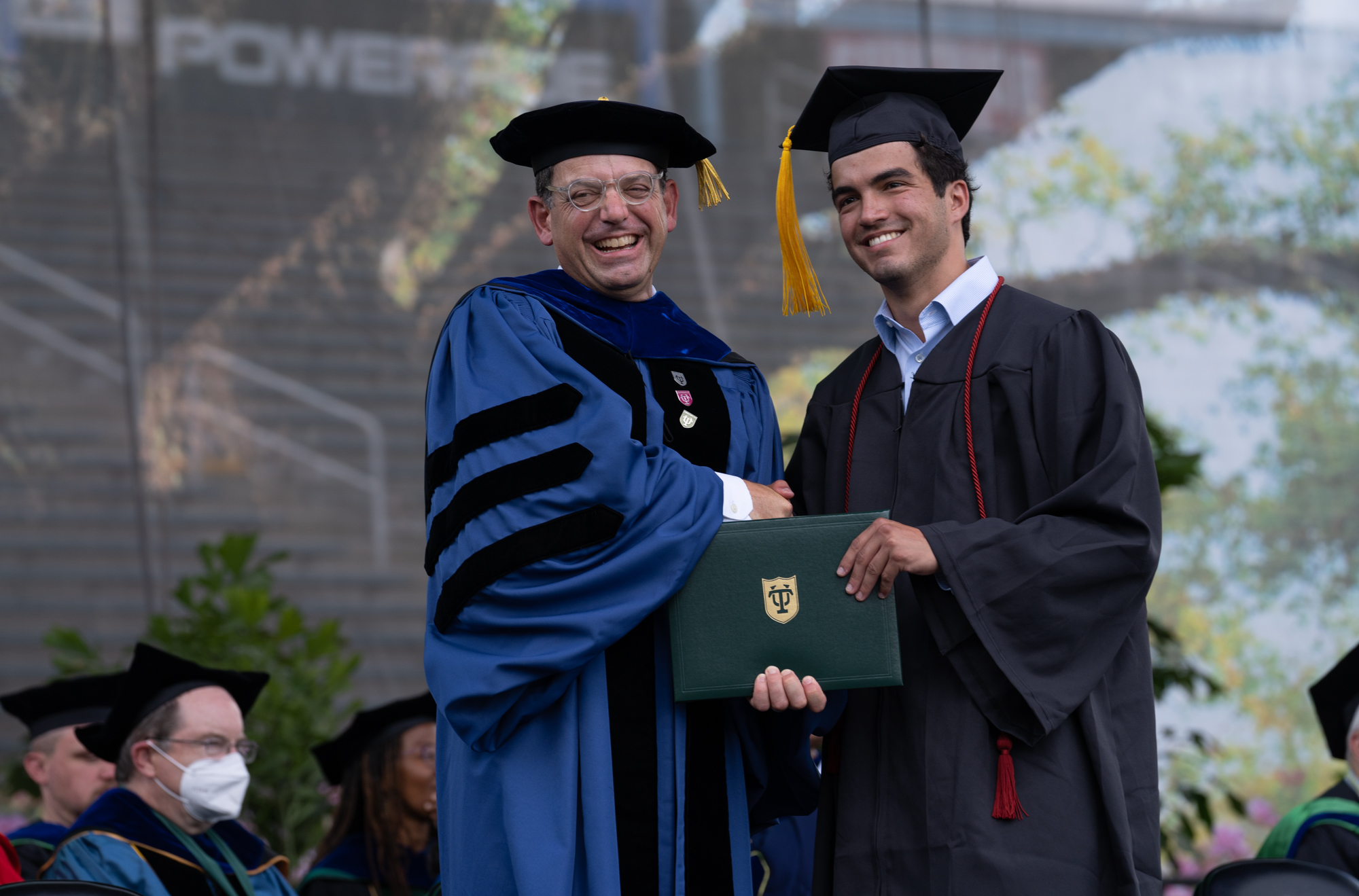 Dean Edwards handing out diplomas