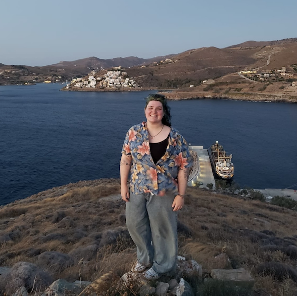 Subject standing next to sea