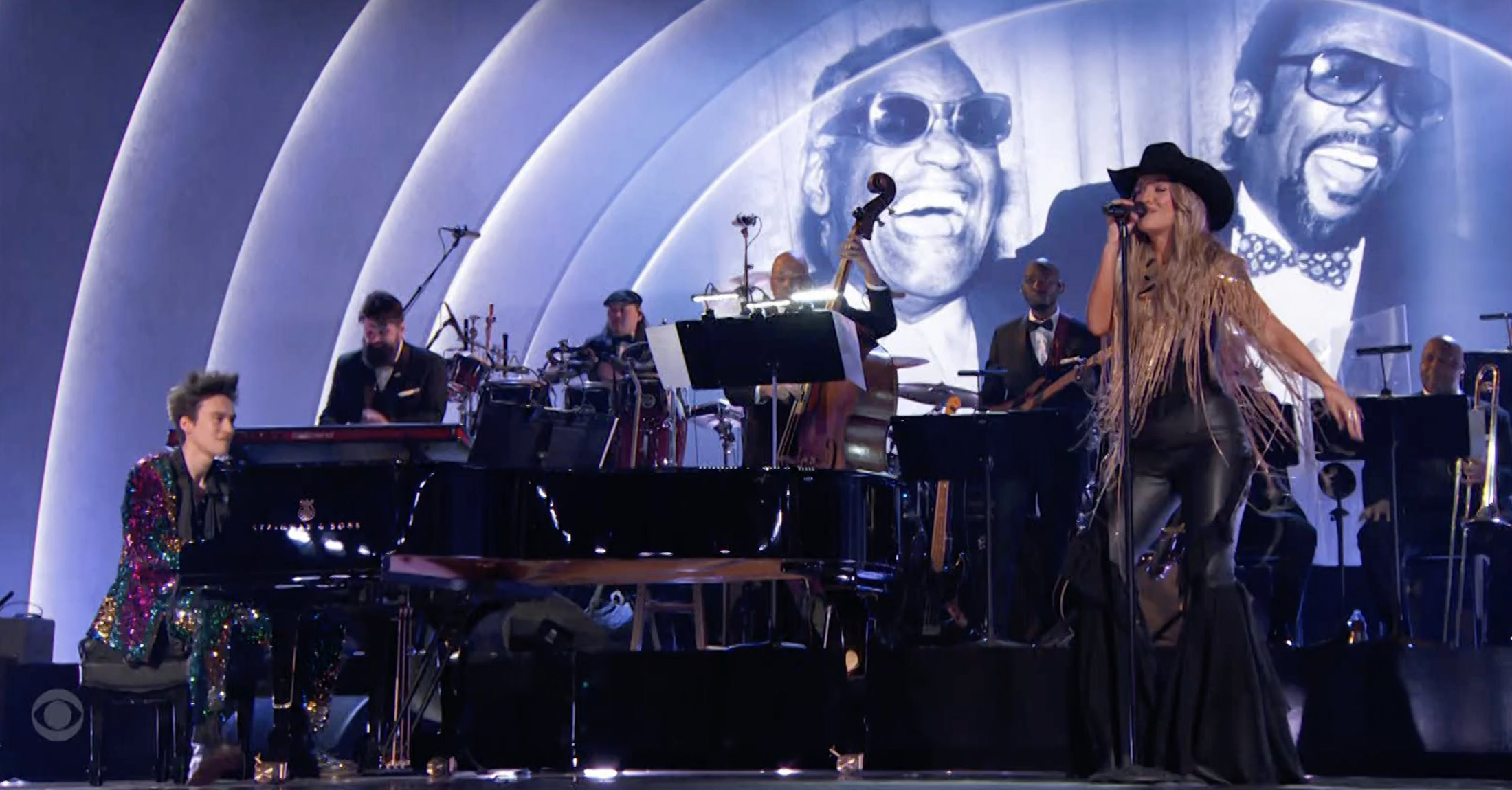 Taku Hirano provides musical accompaniment as Lainey Wilson performs during the Quincy Jones Tribute at the 2025 GRAMMY Awards