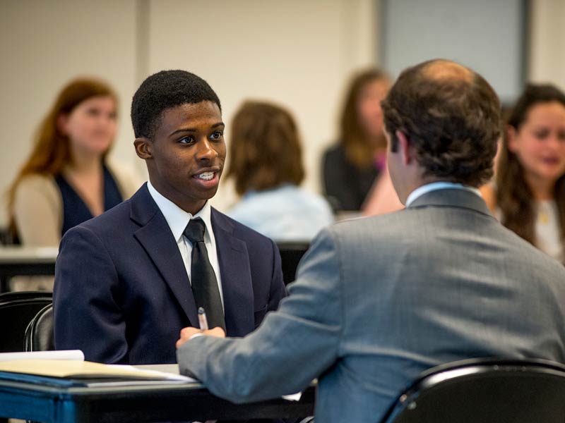 Student takes part in a mock interview