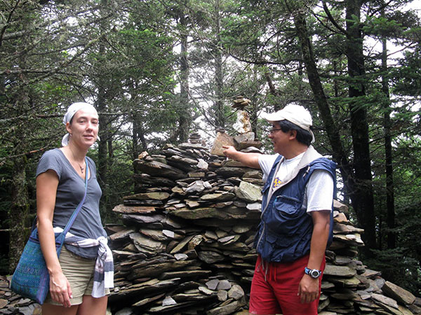 Nathalie and Ajpub' in front of the cairn on top of Mount LeConte.