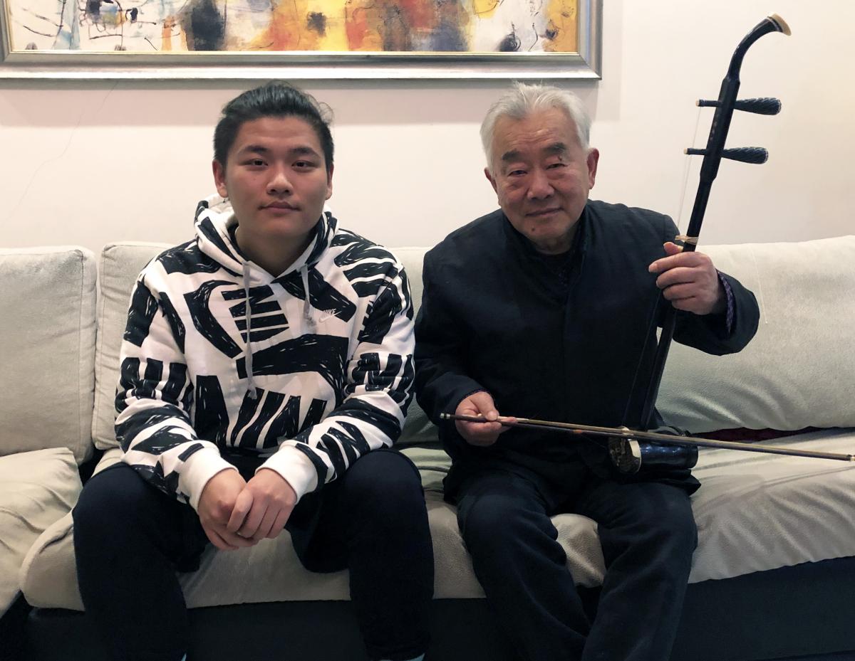 Haochen Hua with his grandfather