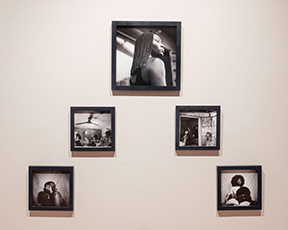 installation of five photographs on wall