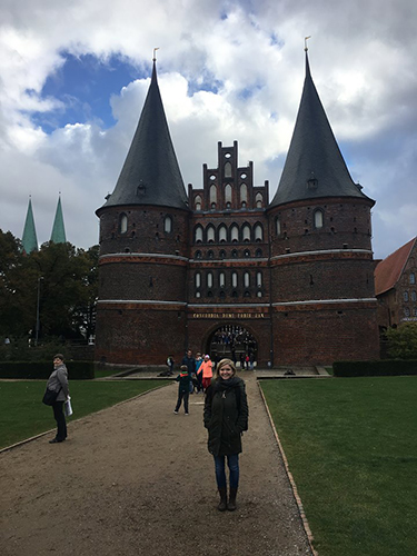 Barker in front of the famous Holstentor in Lübeck