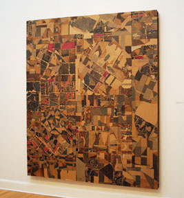 large square artwork of cardboard and markers