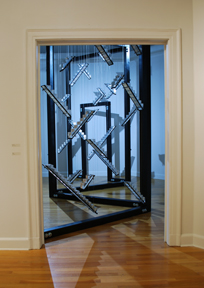 view into rear gallery with door frame and stair elements in glass and steel