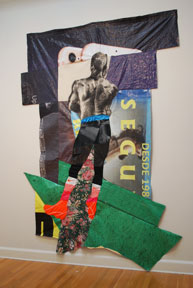 wall-hung fabric collage of young shirtless athlete seen from behind with school sports banners
