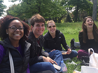 Students enjoying a picnic by Lake Geneva