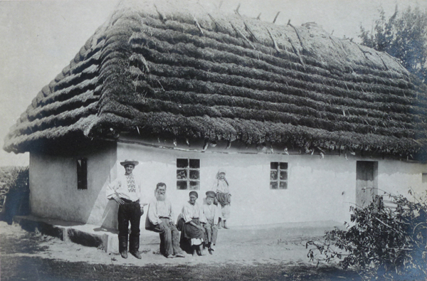 Radom, Poland. Polish farmers in front of a farmhouse