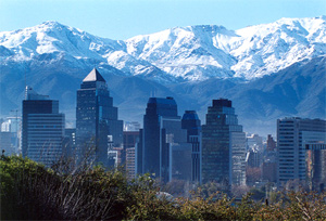 Cityscape with snow topped mountains in the background in Chile