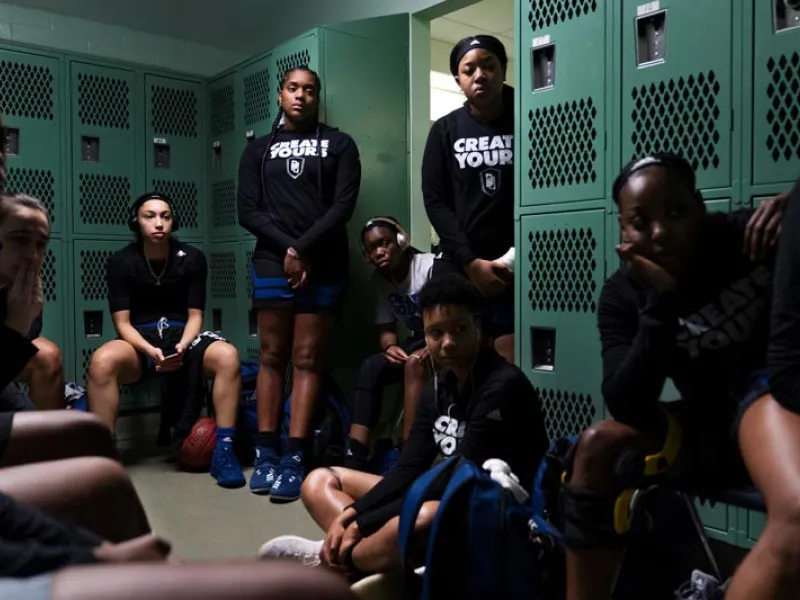 Annie Flannagan and Ashley Teamer Monroe Fellow at Tulane Dillard Girls basketball team