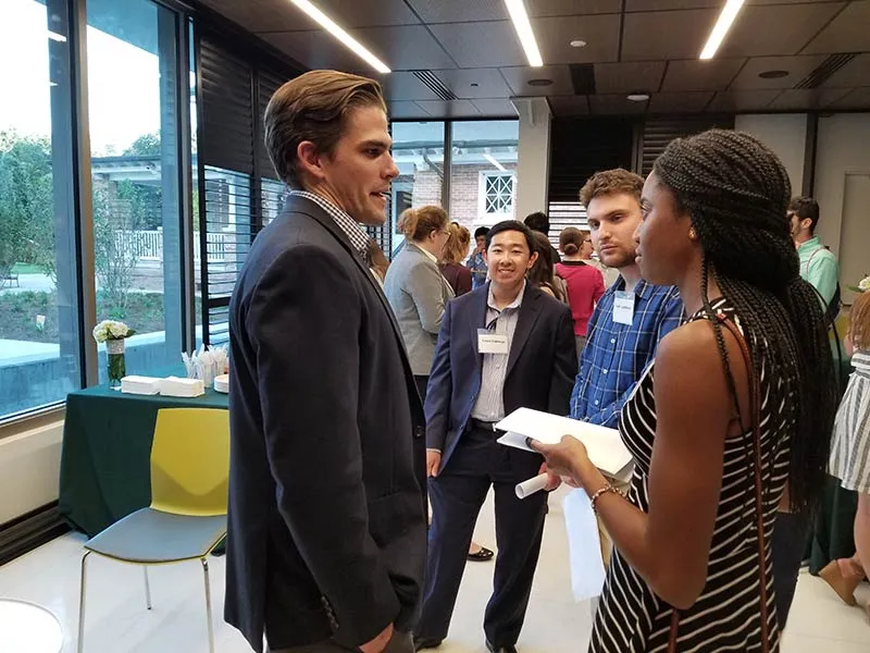 Tulane alum Marshall Cox speaks with political science students