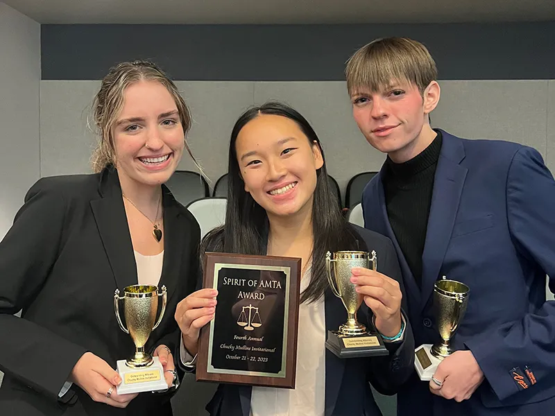 Individual award winners Gracie Gargulio, Yilan Tang, and Robbie Johnson pose for a group photo