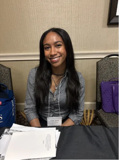 Image of Gabi Janis, a Junior Tulane history major, preparing to present her paper.
