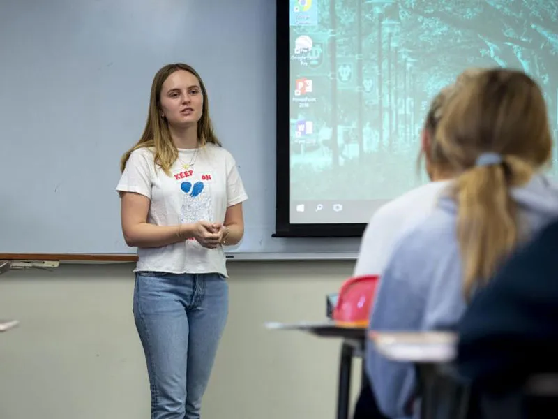 Tulane University SLA student Avery Siegel leads a Q & A session