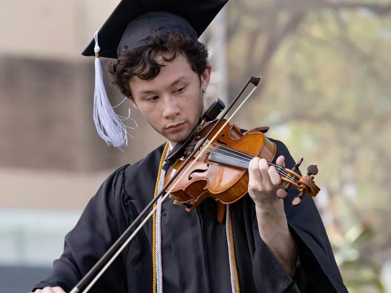 Michael Sze performs "Lamassu" at the School of Liberal Arts commencement ceremony