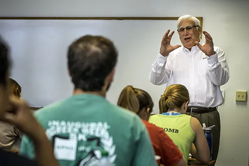 Scott Cowen, Tulane's President Emeritus and Distinguished University Chair, engages Tulane stu