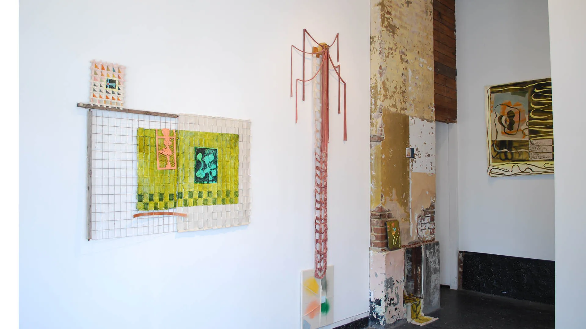 view of paintings by Ansley Givhan on weathered walls of The Front