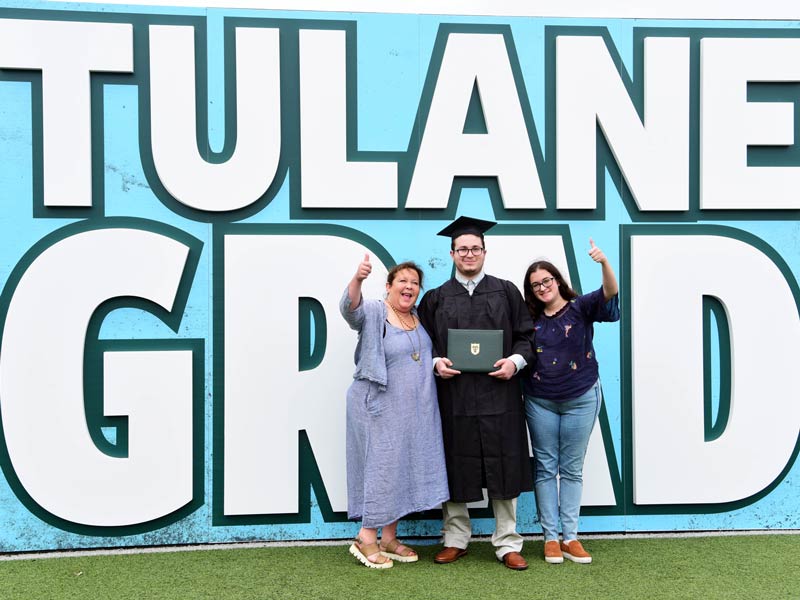 Tulane grad poses with proud family